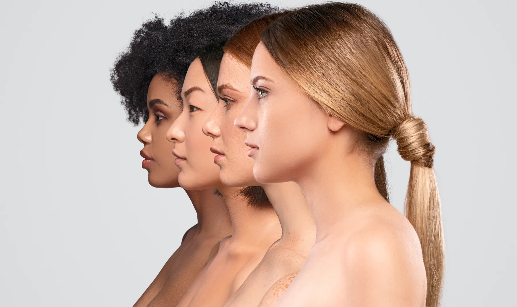 Four women in profile, one behind the other, showing the jawline and neck